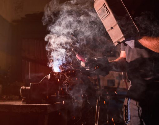 worker using an oxyacetylene welder